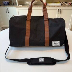 Herschel Black and Brown Duffel Bag